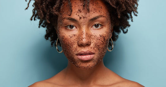 A woman with scrub on her face, demonstrating a natural exfoliation method for clear skin.